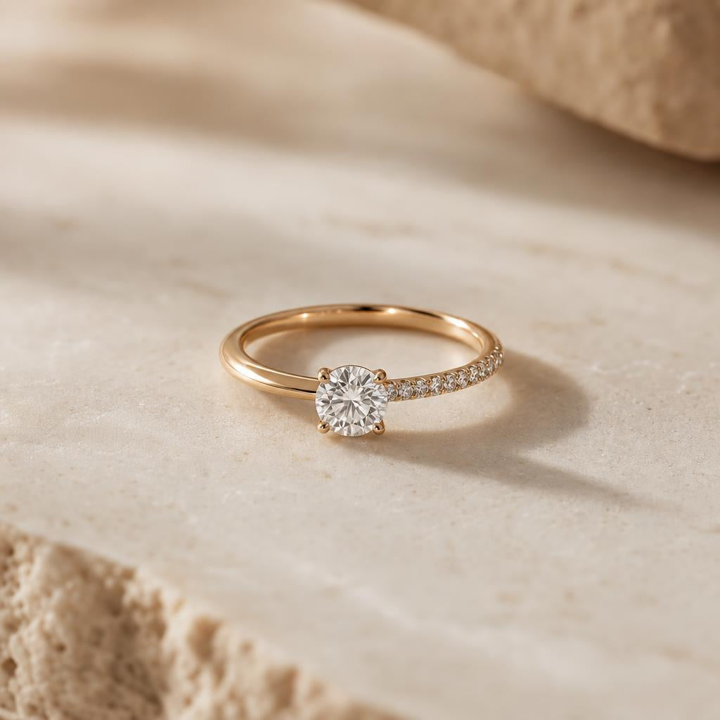 Elegant ring showing solitaire and pavé setting styles side by side