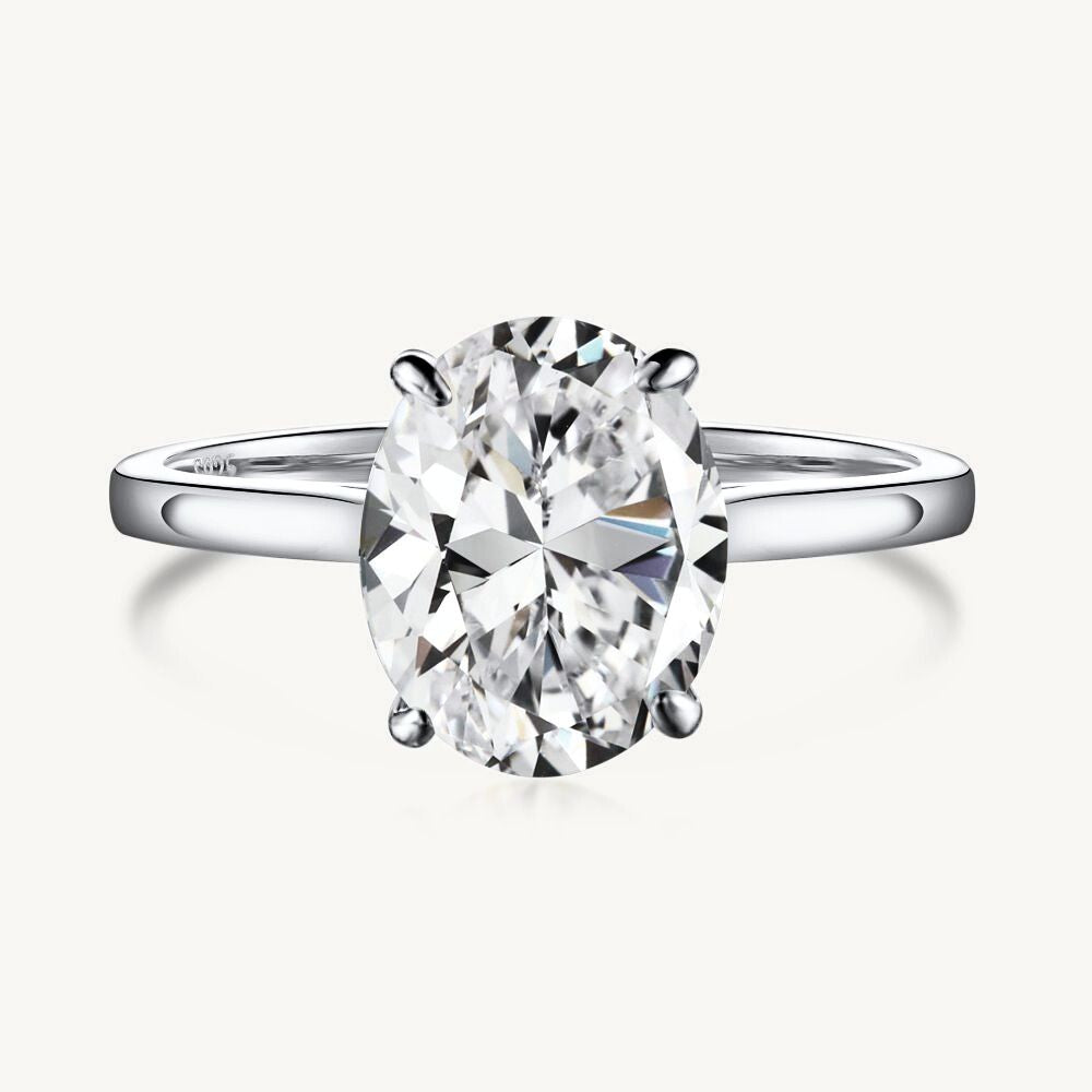 oval travel engagement ring dupe — The Celeste Ring by Gemiros